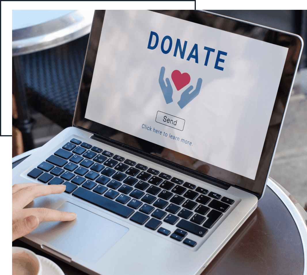 22dGroup 1 (1) Laptop displaying a donation webpage with a heart held by hands and a "Send" button.
